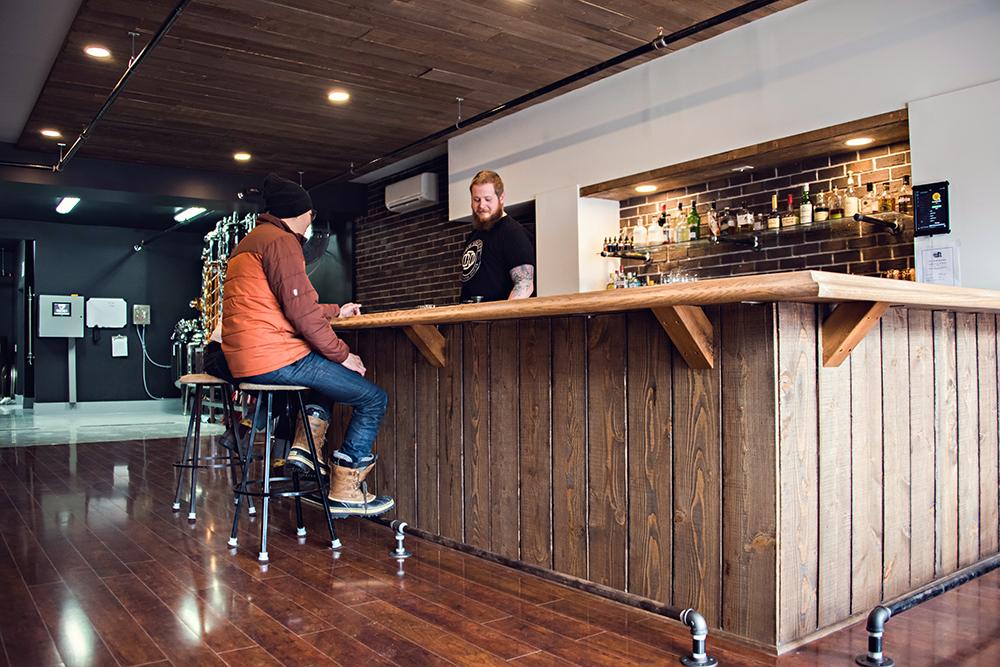 At the tasting bar at Monashee Craft Distillery